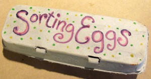 Sorting Easter eggs egg carton