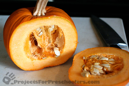 Slice a side of the pumpkin off