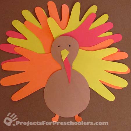 Make hand-print turkeys from colored paper - Projects for Preschoolers