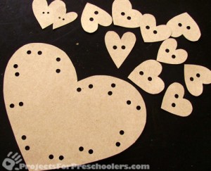 Cut hearts from cardboard
