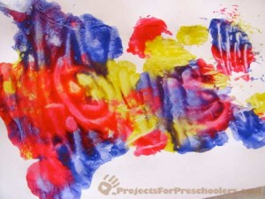 make a finger painting between wax paper