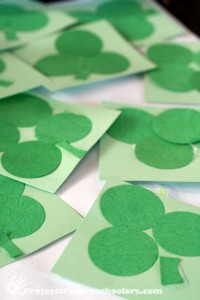 Making shamrocks and 4 leaf clovers from paper circles