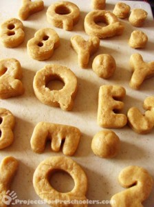 alphabet doughnuts cut out and ready to cook