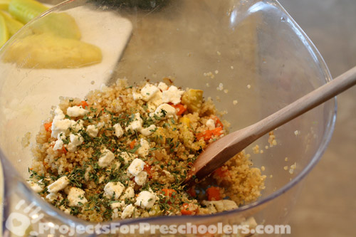 Cook Quinoa, and mix all chopped ingredients plus cheese and spices