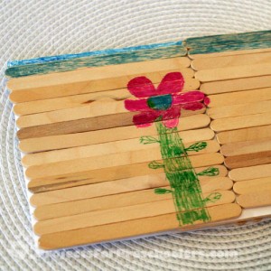 Coloring on popsicle sticks with markers