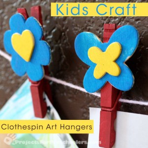 Clothespin art hangers painted with Plaid paint