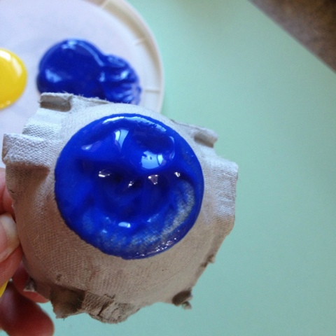 dip circle end of egg carton section in paint dip circle end of egg carton section in paint