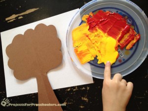 place finger in paint