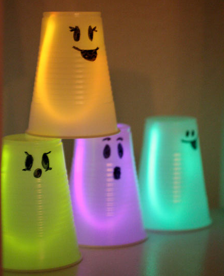 glowing ghosts with plastic cups