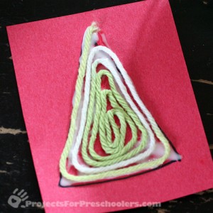 Place yarn on glue