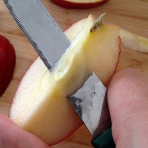 Cut out core of apple slices